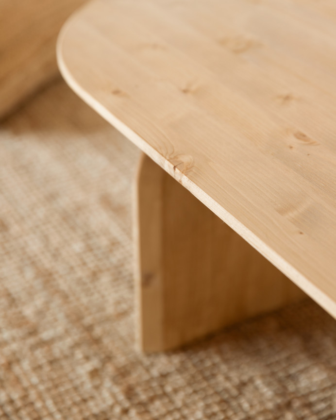 Oval solid wood coffee table in medium oak tone of various sizes