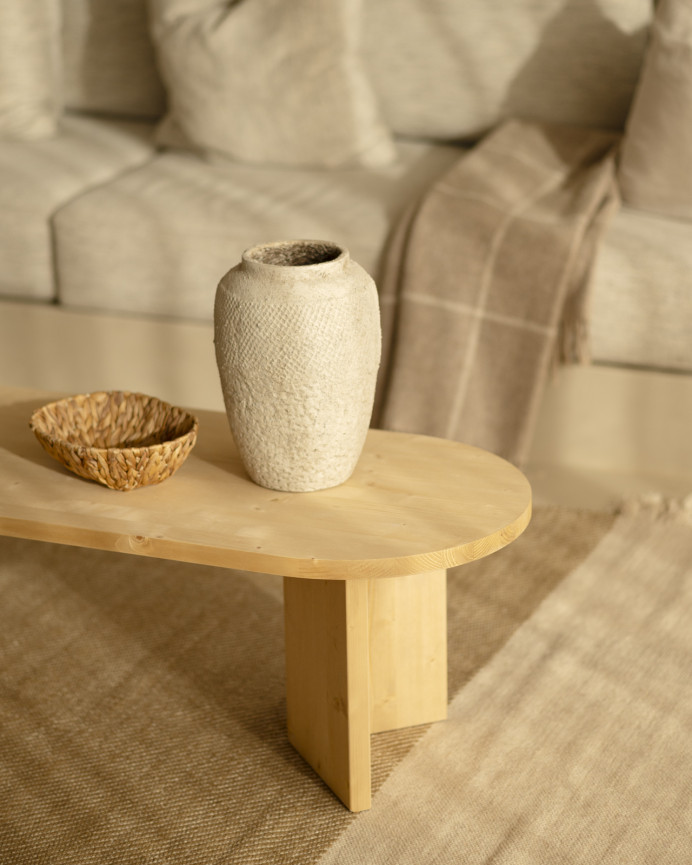 Solid wood coffee table in medium oak tone measuring 120cm.
