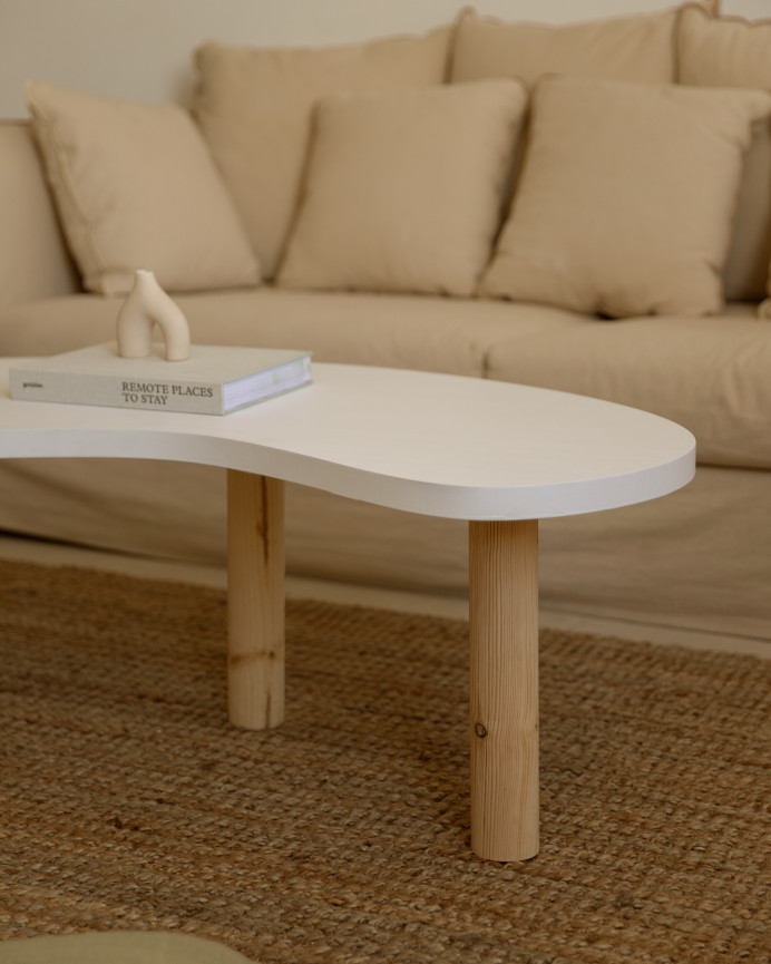 Solid wood organic-shaped coffee table in white tone with natural tone legs of various sizes