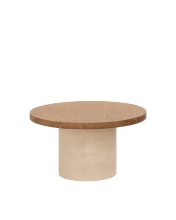 Round solid wood coffee table in a dark oak tone with a earth-tone microcement leg, available in various sizes.