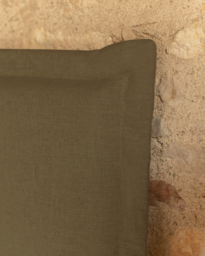 Upholstered green linen headboard with removable cover, available in various sizes.