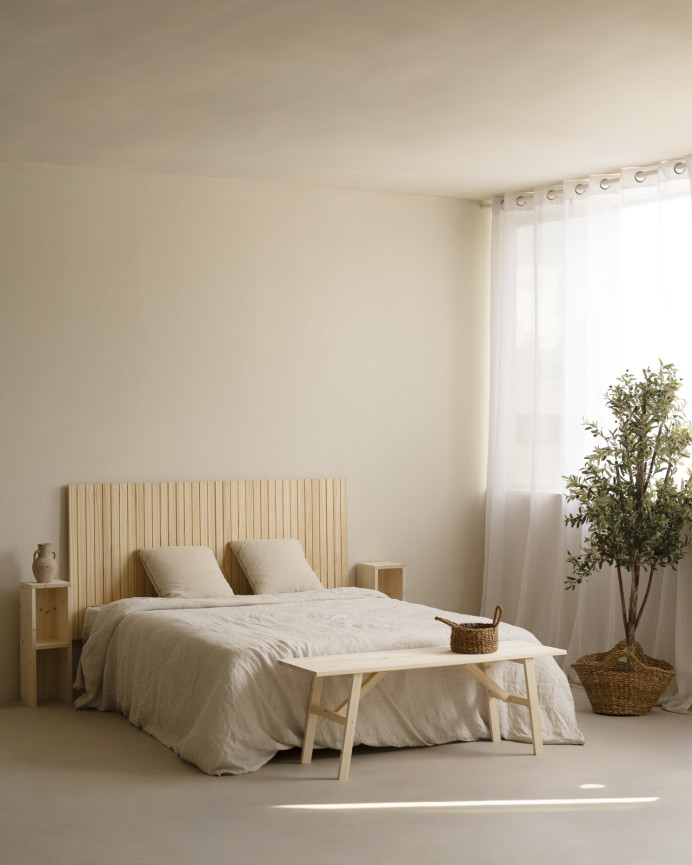 Grooved solid wood headboard in natural tone, available in various sizes.