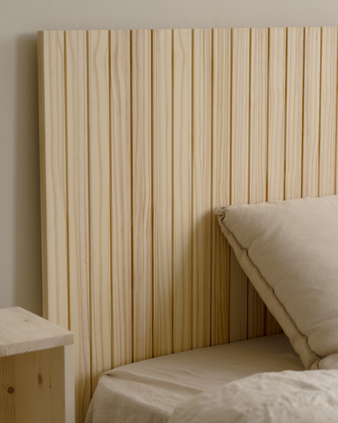 Grooved solid wood headboard in natural tone, available in various sizes.