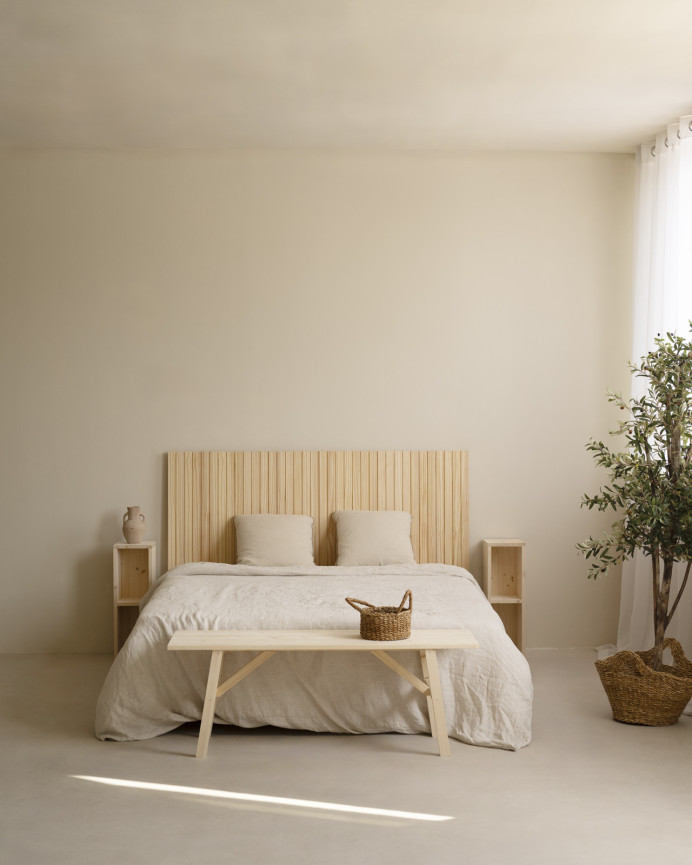 Grooved solid wood headboard in natural tone, available in various sizes.