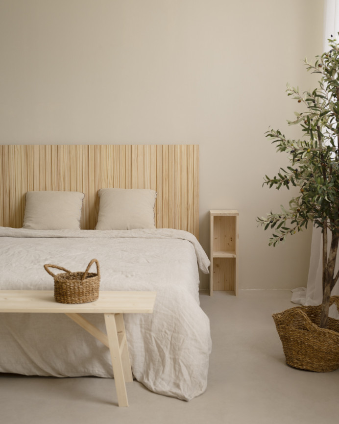 Grooved solid wood headboard in natural tone, available in various sizes.