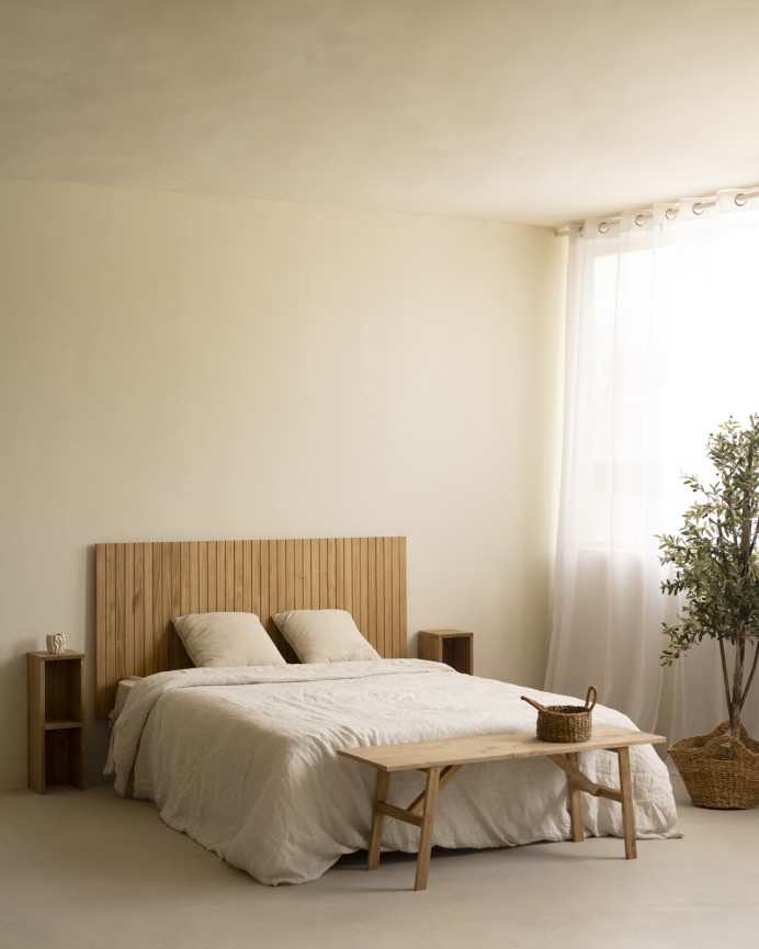 Slotted solid wood headboard in medium oak tone in various sizes.