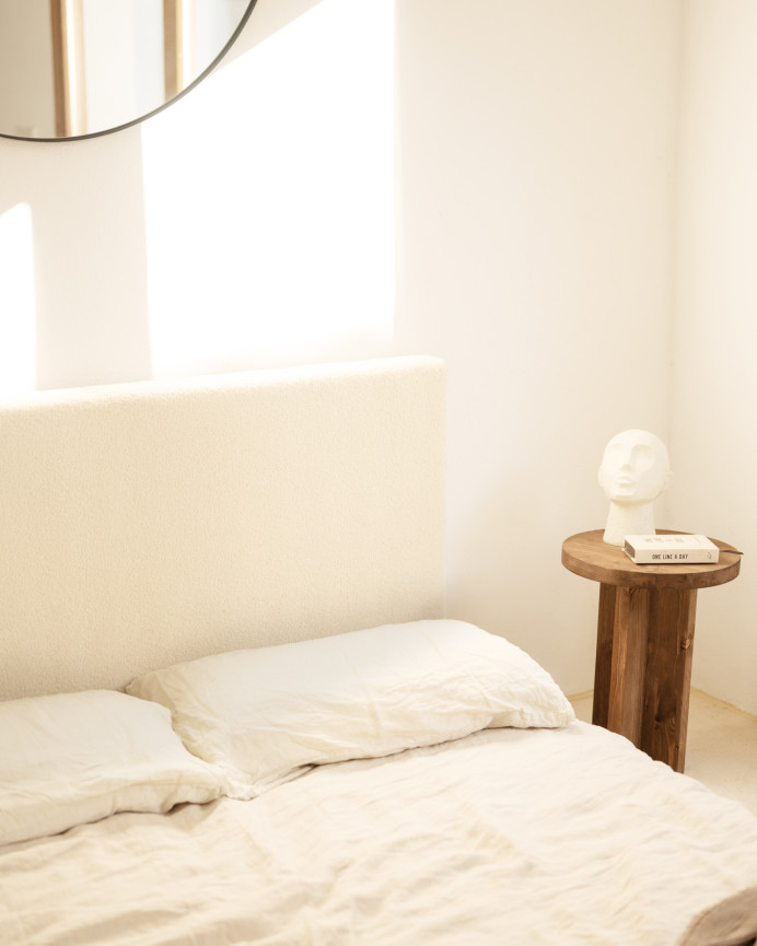 Upholstered cotton headboard in bone color available in various sizes.