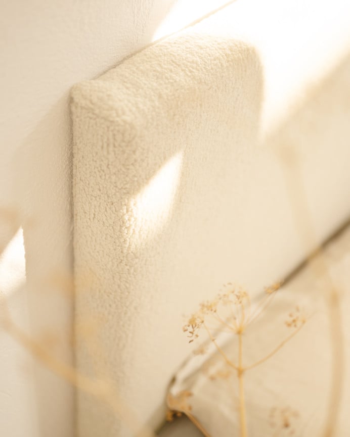 Upholstered cotton headboard in bone color available in various sizes.