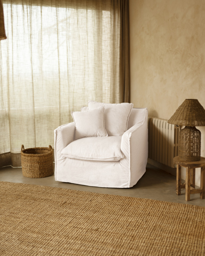 Cotton and linen slipcovered white armchair measuring 98x90cm.