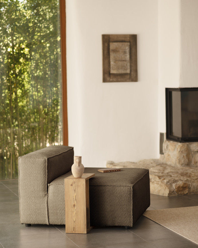 Brown bouclé armchair measuring 110x90cm