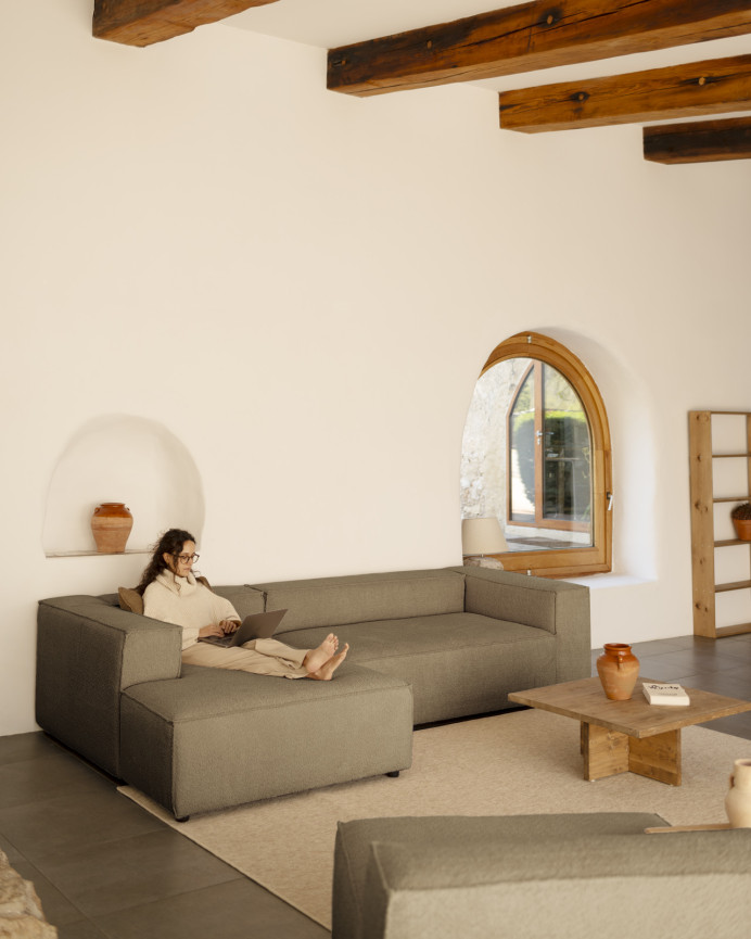 Brown bouclé armchair measuring 110x90cm