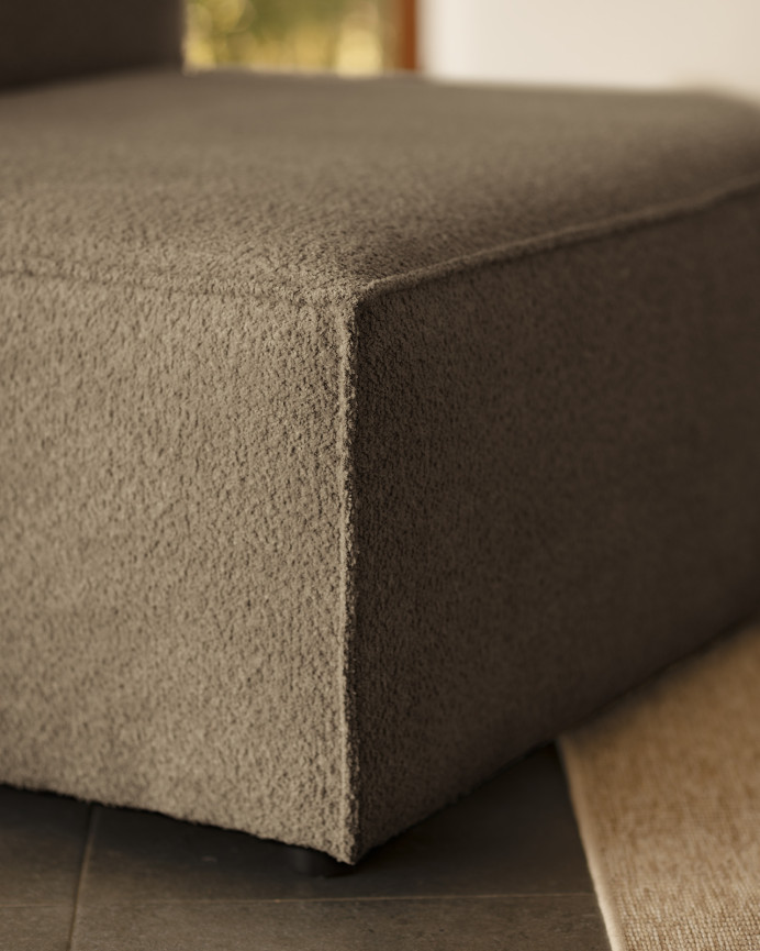 Brown bouclé armchair measuring 110x90cm