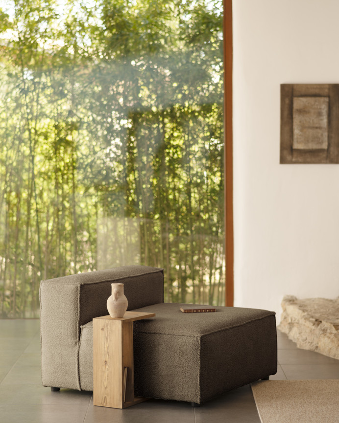 Brown bouclé armchair measuring 110x90cm