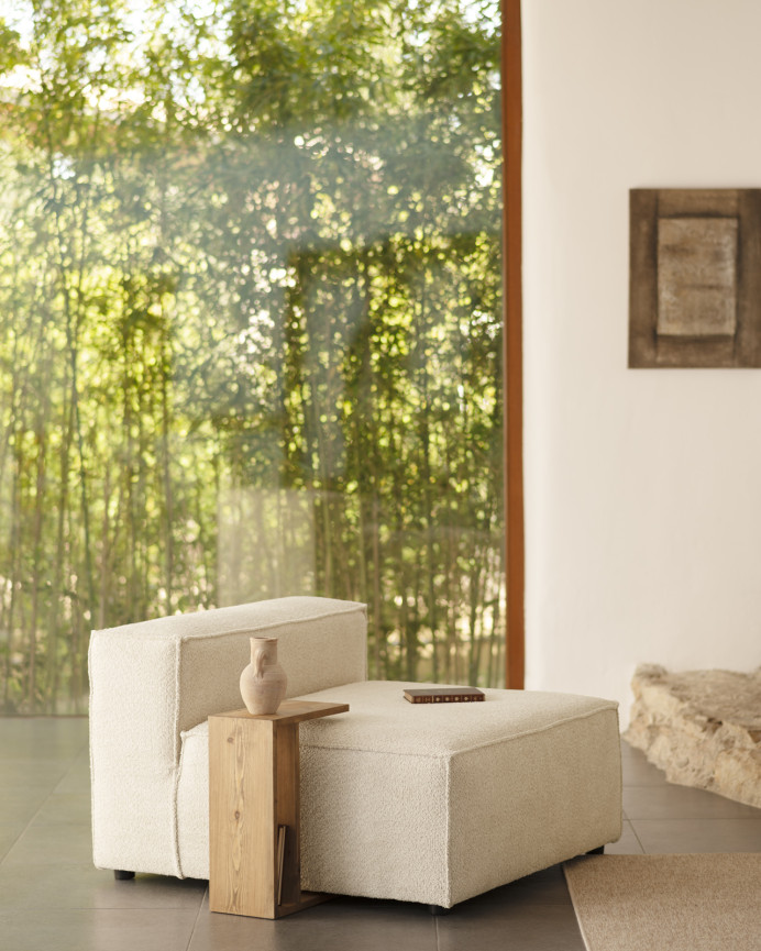 Off-white bouclé armchair measuring 110x90cm.