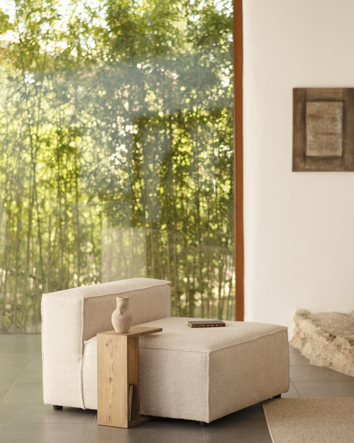 Beige bouclé armchair measuring 110x90cm