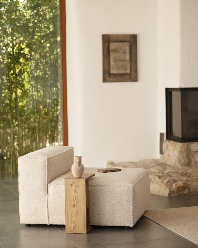 Beige bouclé armchair measuring 110x90cm