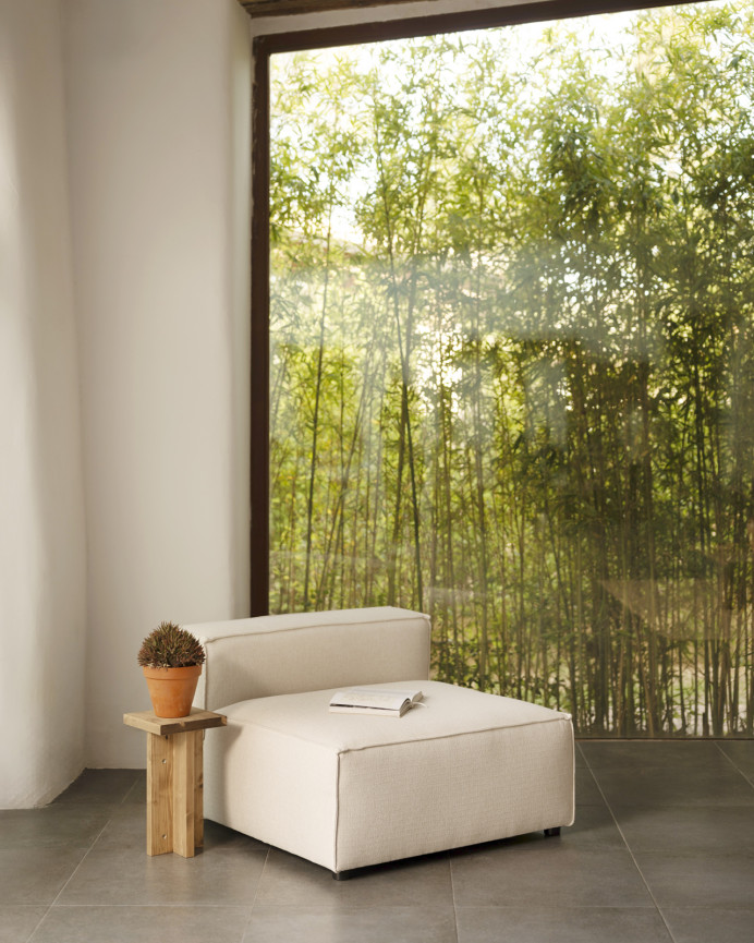 Off-white armchair measuring 110x90cm.