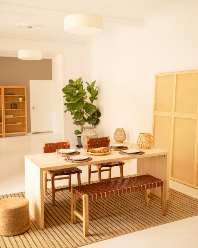 Solid wood dining table in natural tone available in various sizes