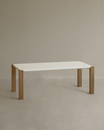 Rectangular coffee table in off-white matte finish and poplar wood legs available in various sizes.