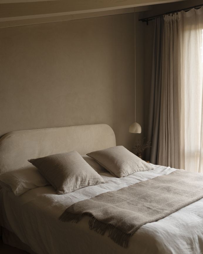 Upholstered headboard with removable beige corduroy cover in various sizes.