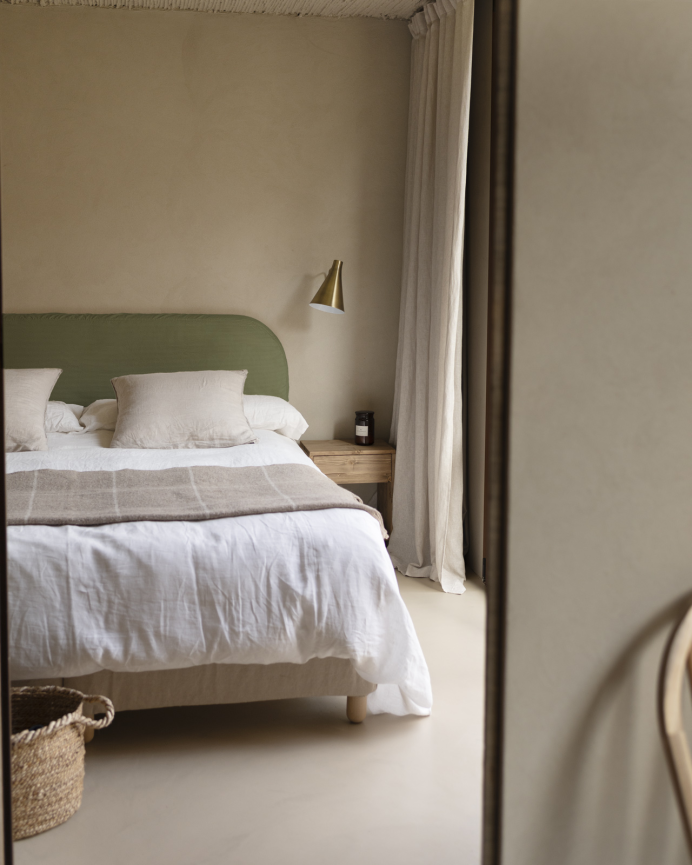 Upholstered green corduroy headboard with removable cover in various sizes.