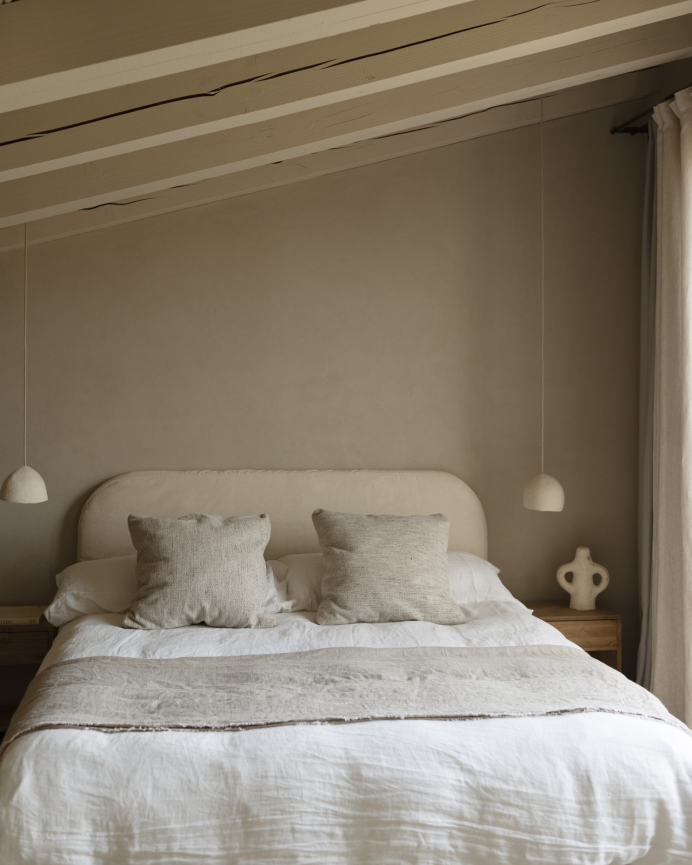 Upholstered headboard with removable beige corduroy cover in various sizes.