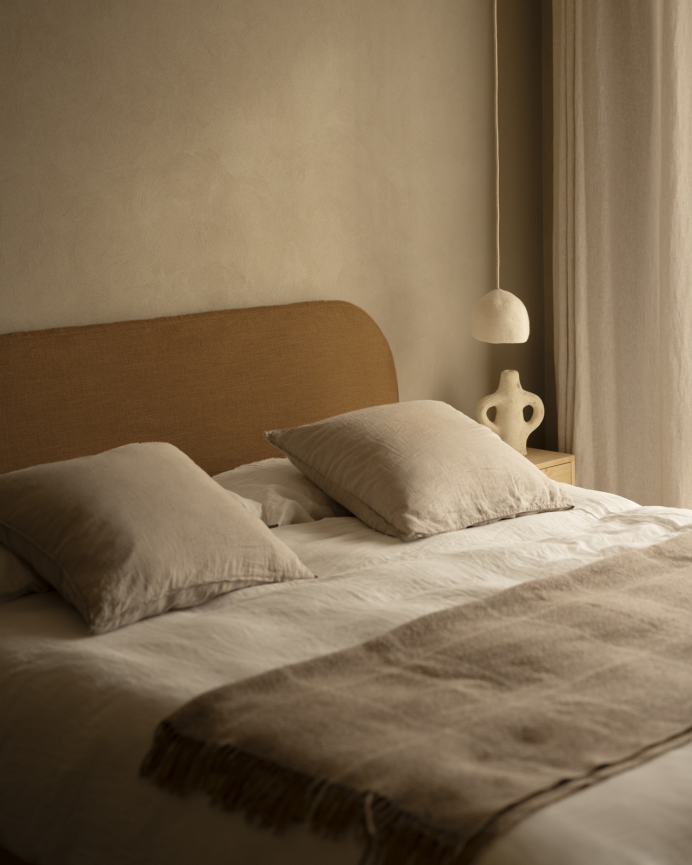 Removable linen upholstered headboard in terracotta in various sizes.