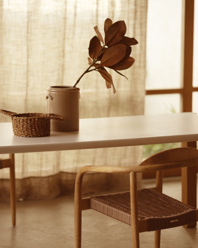 Rectangular dining table in a matte off-white tone and poplar wood legs in various sizes.