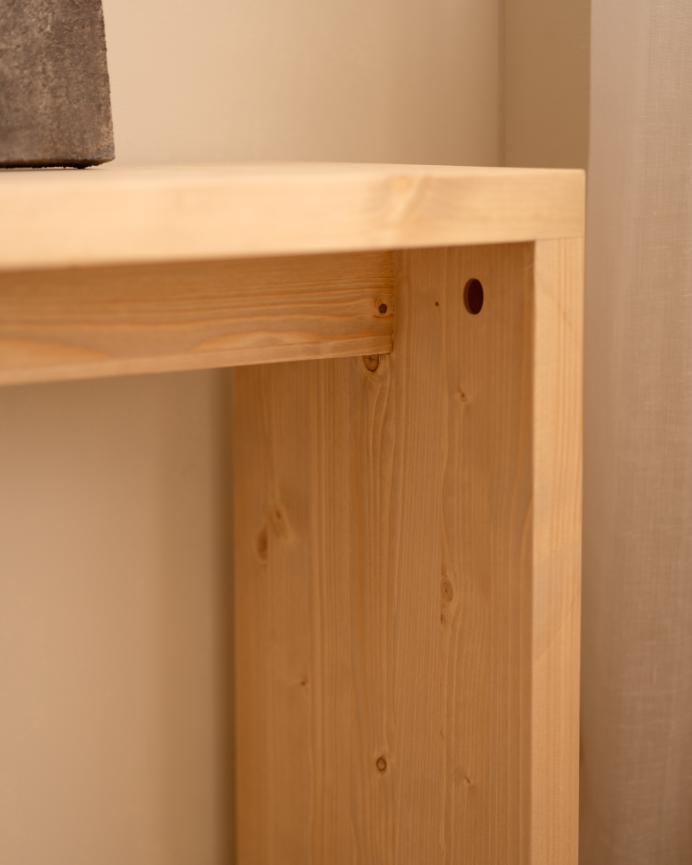 Solid wood console in a medium oak tone measuring 120x80cm.