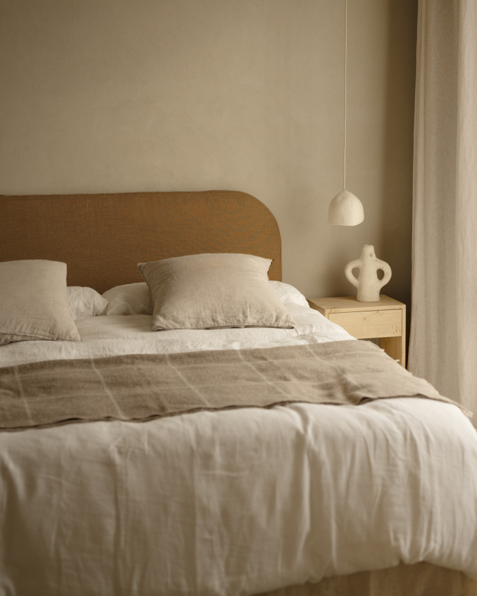 Removable linen upholstered headboard in terracotta in various sizes.