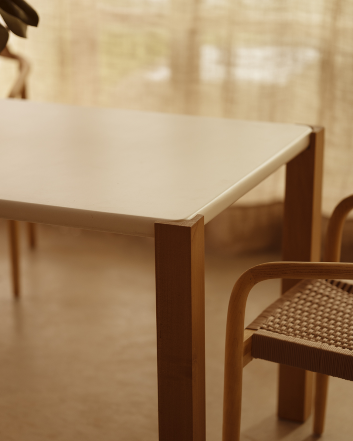 Rectangular dining table in a matte off-white tone and poplar wood legs in various sizes.