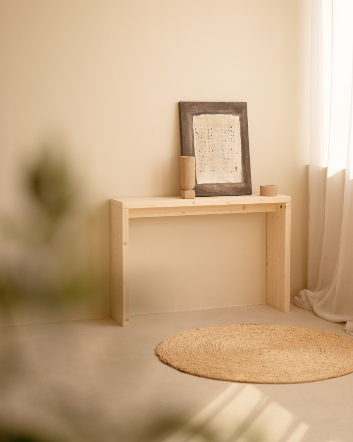 Solid wood console table in natural tone measuring 120x80cm.