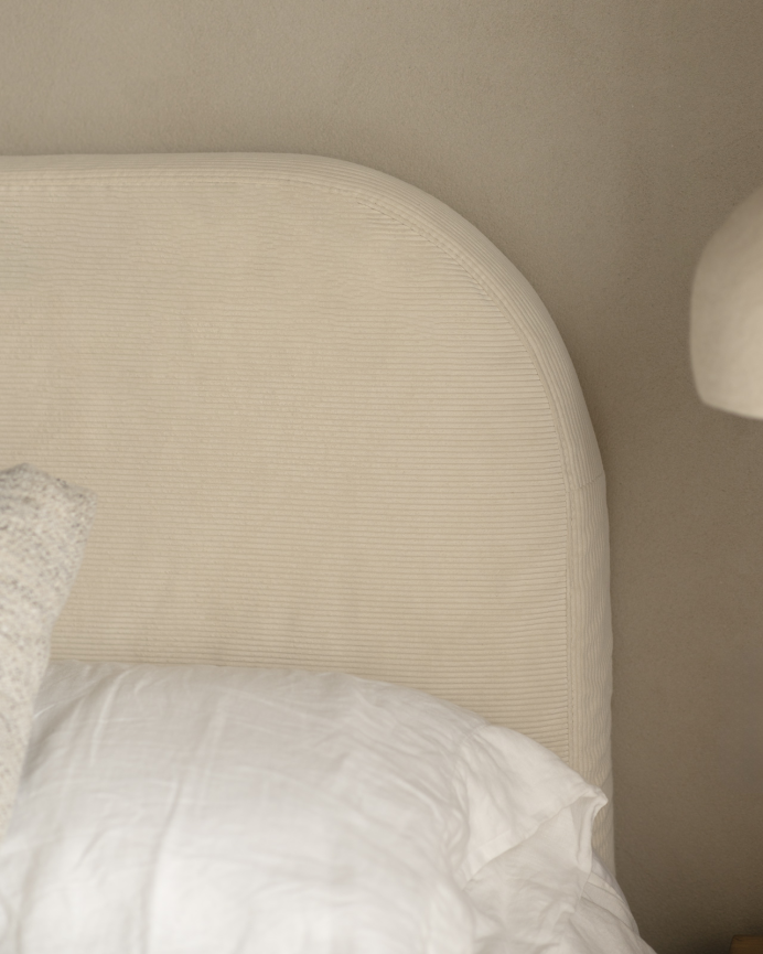 Upholstered headboard with removable off-white velvet cover, available in various sizes.