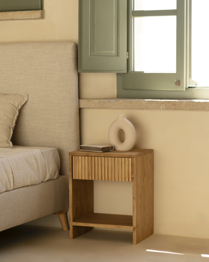 Solid wood bedside table with a medium oak-tone drawer in various sizes.