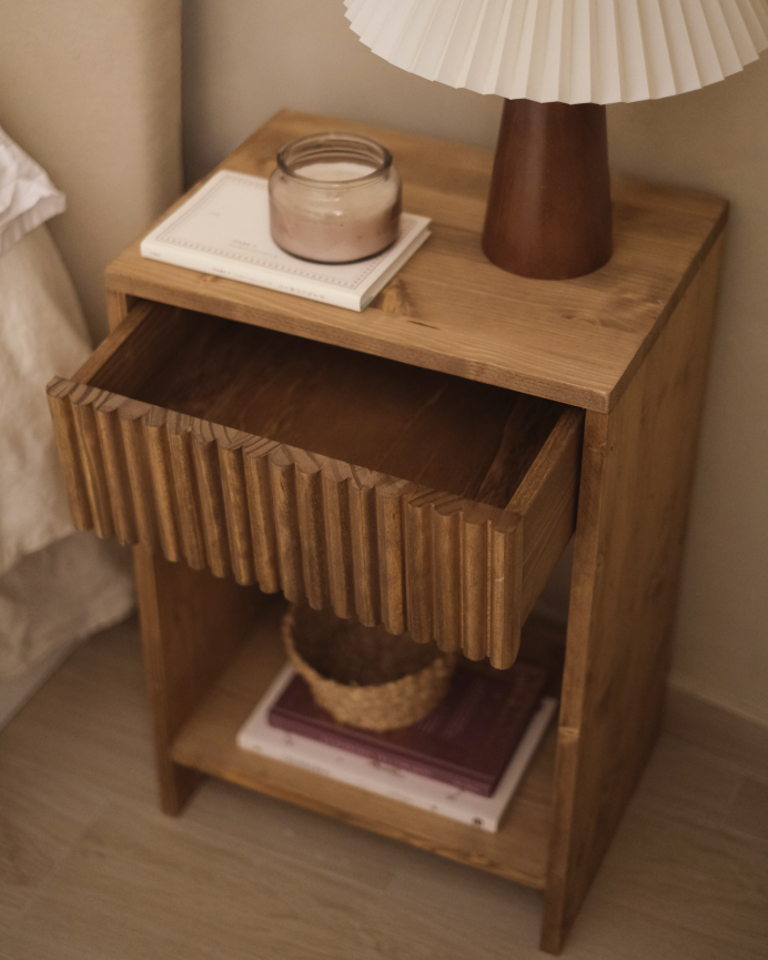 Solid wood nightstand with a single drawer in a dark oak finish, available in various sizes