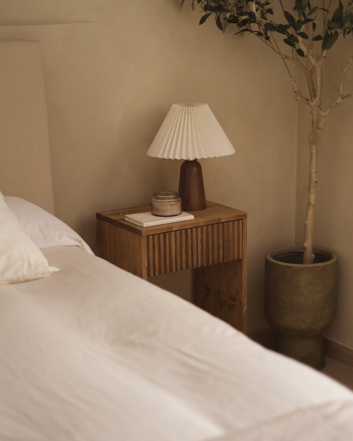 Solid wood nightstand with a single drawer in a dark oak finish, available in various sizes