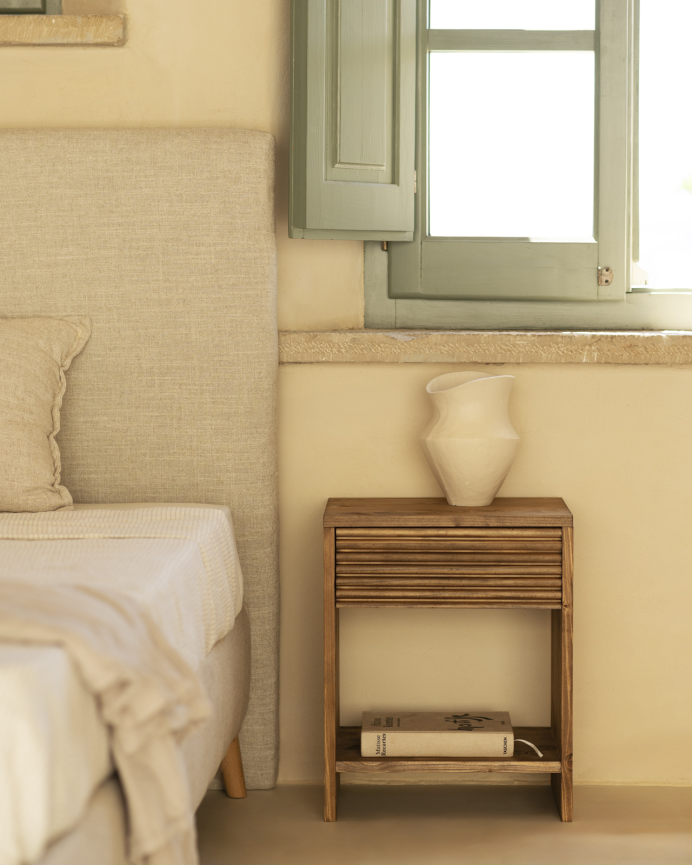 Solid wood bedside table with one drawer in a dark oak tone of various sizes.