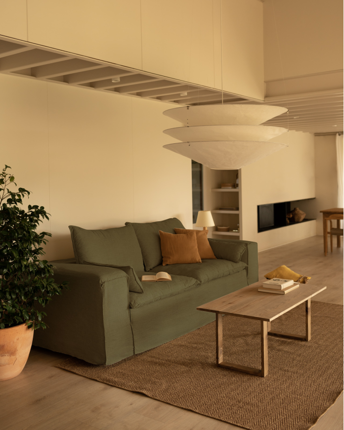 Removable green linen sofa available in various sizes.