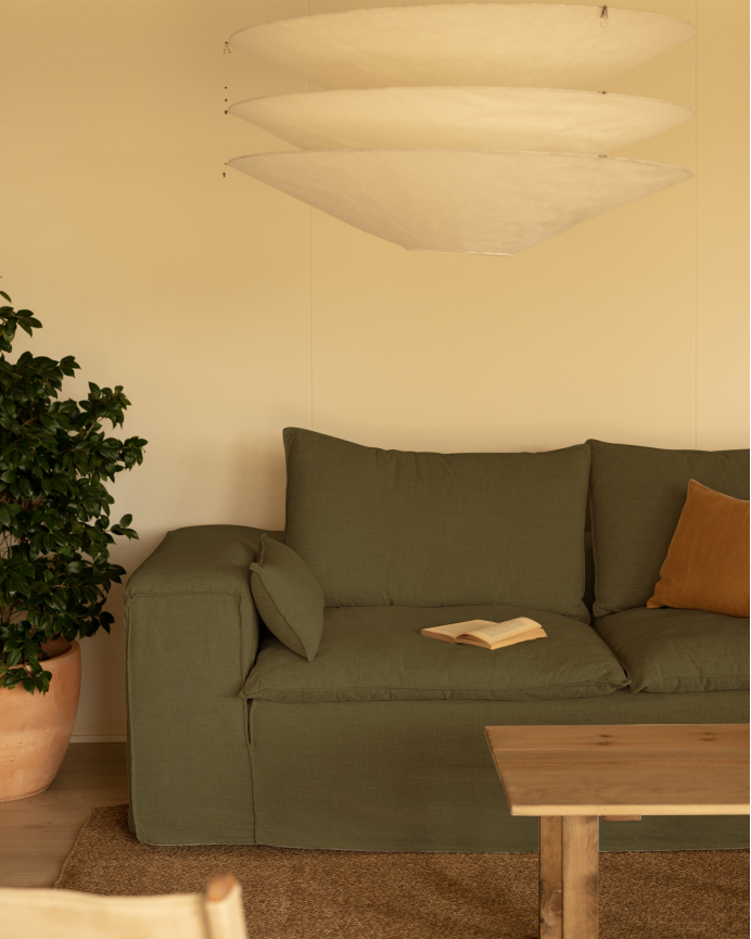 Removable green linen sofa available in various sizes.