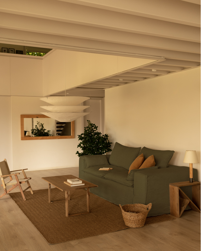 Removable green linen sofa available in various sizes.