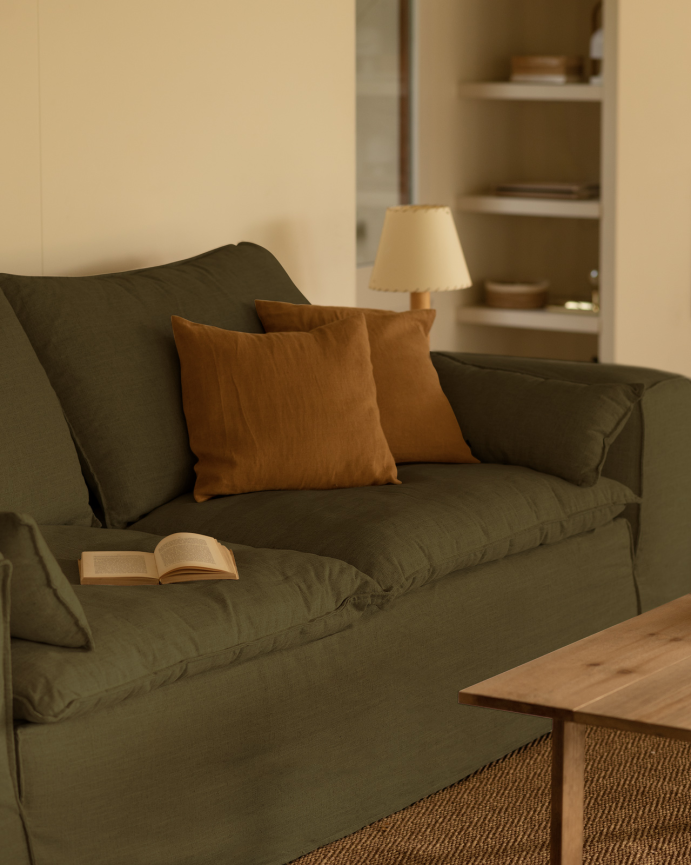 Removable green linen sofa available in various sizes.