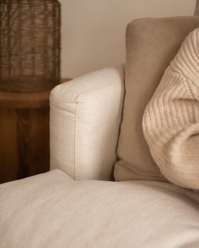 Straight sofa in off-white color measuring 325x105cm.