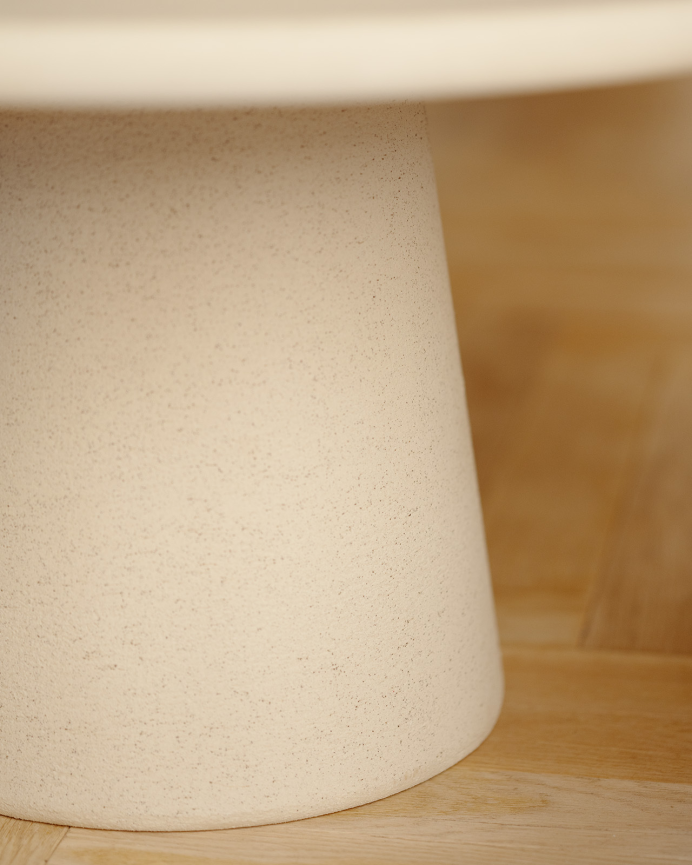 Round beige microcement coffee table in various sizes