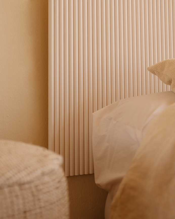 Solid wood headboard in white tone available in several sizes.