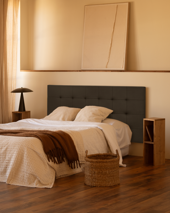 Upholstered polypiel headboard with pleats in black color in various sizes