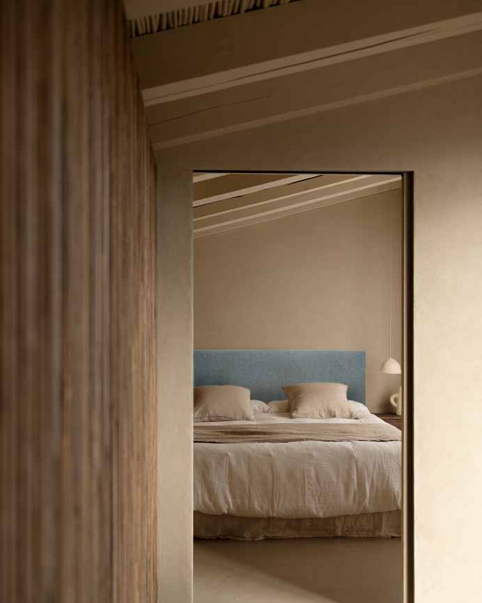 Upholstered polyester headboard in smooth teal green color in various sizes.