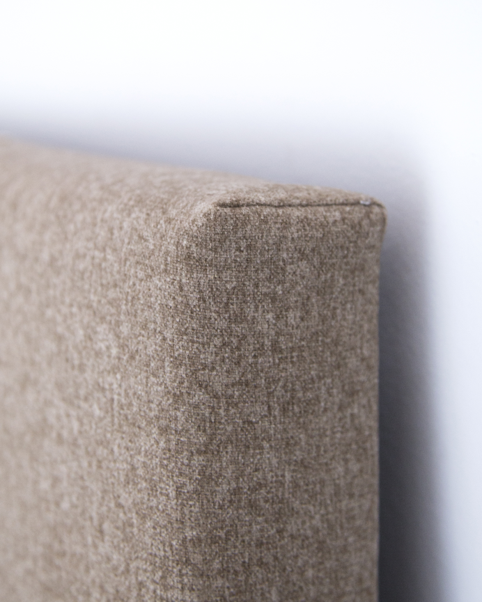 Upholstered polyester headboard in plain brown color available in various sizes.