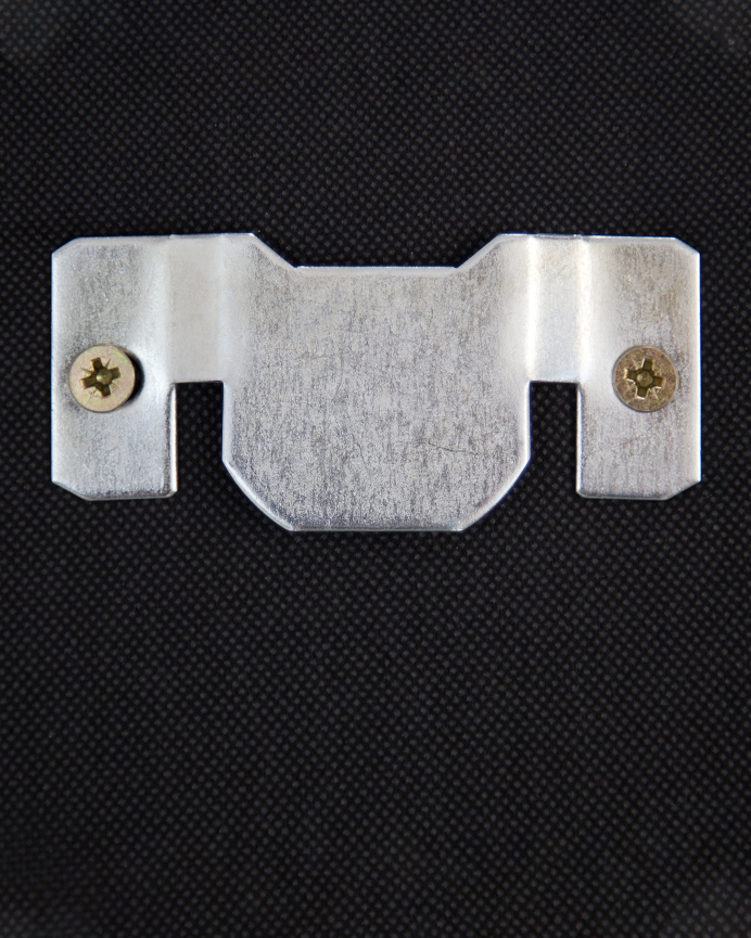 Upholstered headboard in faux leather with beige buttons in various sizes.