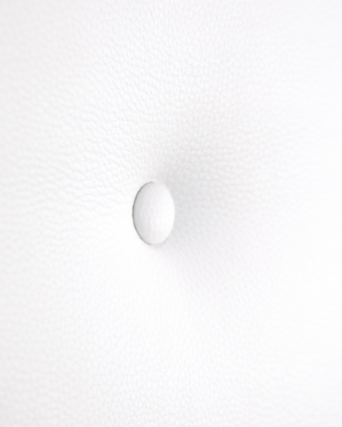 Upholstered faux leather headboard with white buttons in various sizes