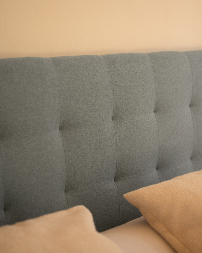 Upholstered polyester headboard with pleats in blue color in various sizes